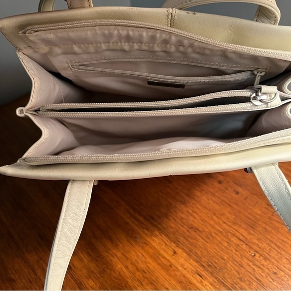 Dillards vintage Leather Ivory Purse
Perforated Diamond Pattern - Picture 8 of 13